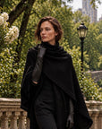 Noir black textured tweed wrap draped around shoulders